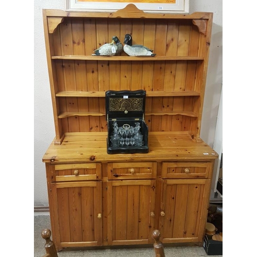 542 - Modern Pine Kitchen Dresser with four open shelves and a three drawer and three cupboard base, c.55i... 