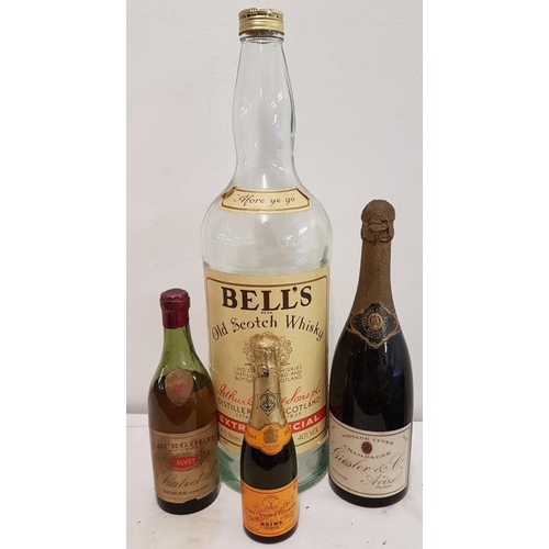 214 - Collection of Champagne and a Bells Scotch Whiskey Bottle