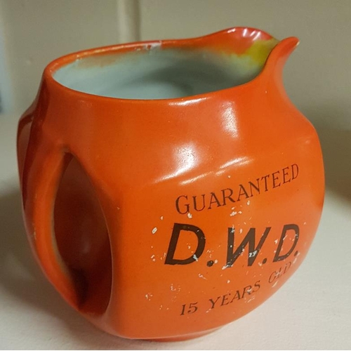 255 - D.W.D. Guaranteed 15 Years Old Water Jug by James Green