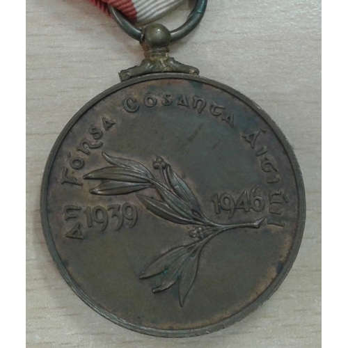 314 - Re na Prainne Medal 1939 - 1946 and a Holy Communion Medal