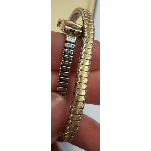 332 - 9ct Gold Lady's Wrist Watch with expandable bracelet