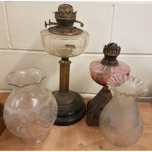 400 - Victorian Ruby Bowl Oil Lamp with Cast Iron Base, a Clear Bowl Lamp and 2 Shades