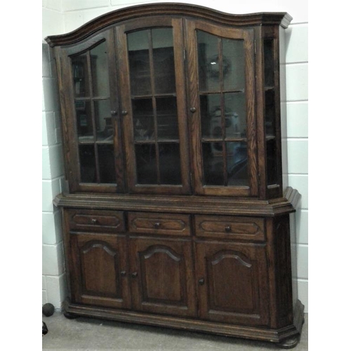 437 - Large Oak Display Cabinet with three glazed doors over a base with three drawers and three cupboards... 