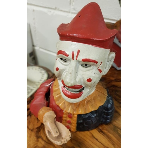 521 - Cast Iron Moneybox in the form of a Clown, c.7.5in tall