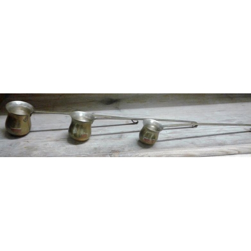 703 - Set of Three Long Handled Brass Measures