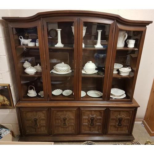 21 - Large Oak Display Cabinet, the arched top with four glazed doors on a base with four solid cupboard ... 