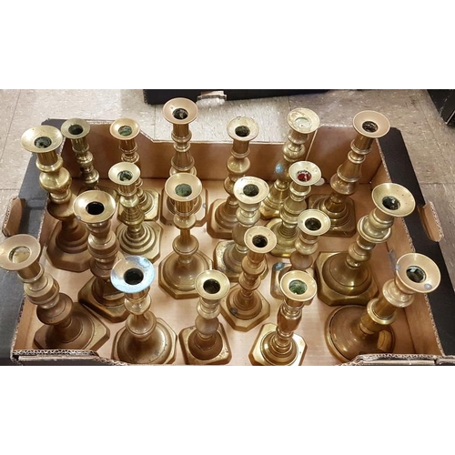 116 - Large Collection of Brass Candlesticks