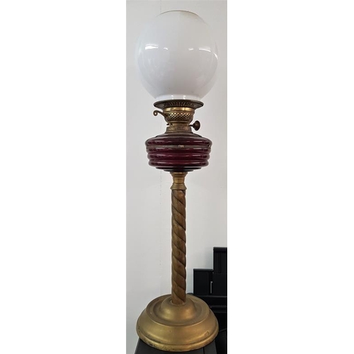 646 - Victorian Ruby Bowl Oil Lamp on a turned brass column, c.27in tall