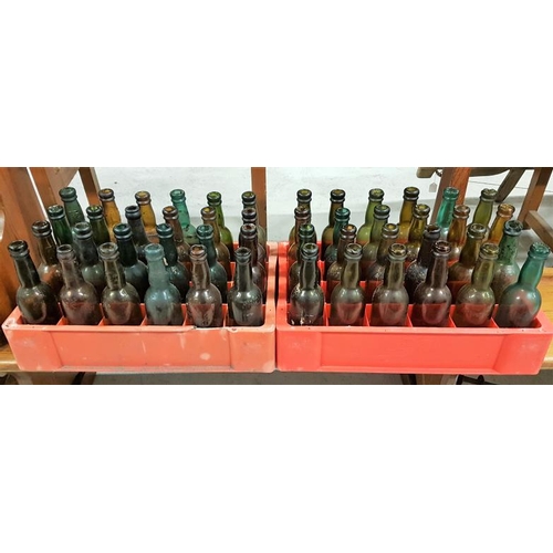 60 - Two Crates of Saorstat Eireann Coloured Bottles, c.48