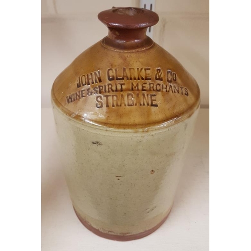53 - John Clarke & Co., Wine and Spirit Merchants, Strabane - Stoneware Whiskey Jar (with repairs)... 