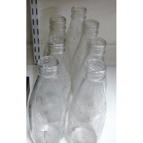 72 - Collection of Seven Old Milk Bottles