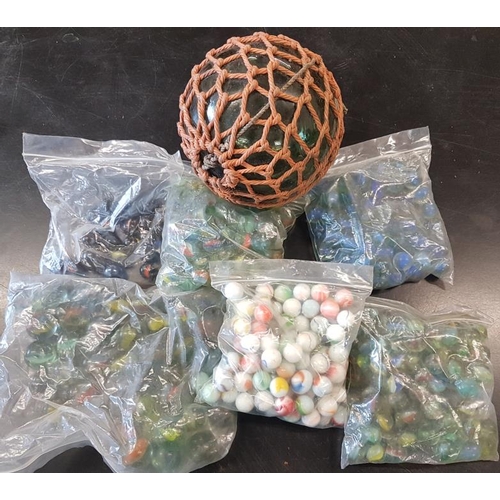 204 - Six Bags of Marbles and a Glass Fishing Float