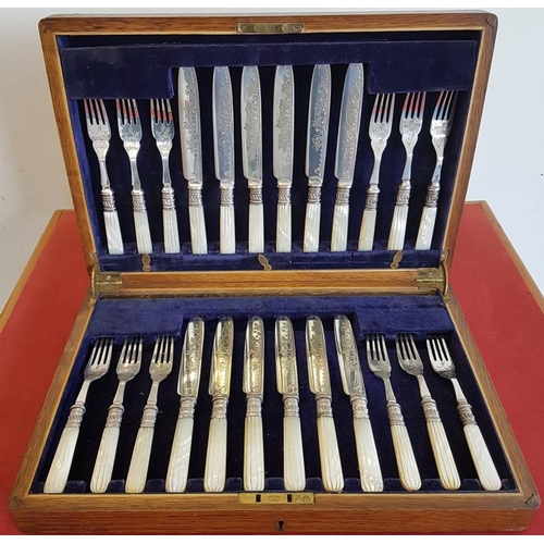 593 - 25 Piece set of Enamel M.O.P. Dessert Set with Fluted Carvings in an Oak Case