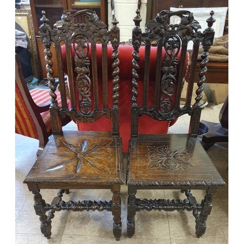 644 - Near Pair of Victorian Gothic Style Carved Oak Hall Chairs