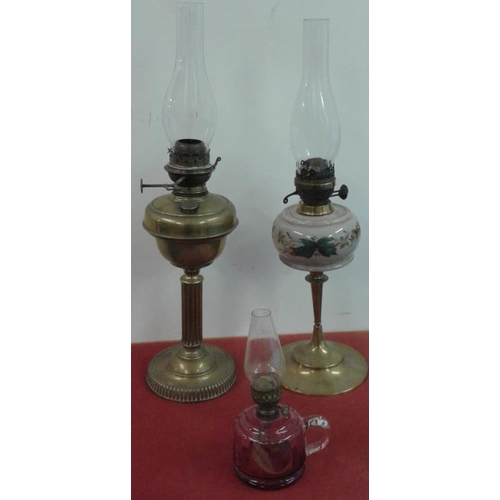 679 - Two Victorian Oil Lamps and a Ruby Glass Finger Lamp