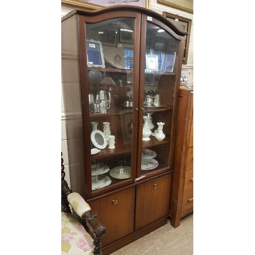 39 - Modern Two Door Display Cabinet, the arched top with glazed doors above two lower cupboards, c.32.5 ... 
