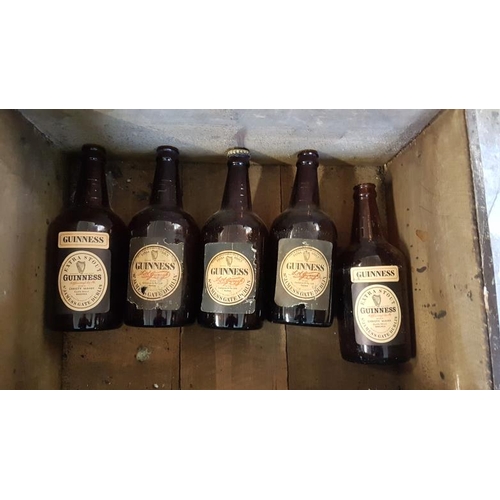 241 - Original Guinness Bottle Crate with a selection of original Guinness bottles