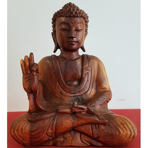 253 - Carved Wooden Figure of Buddha (13.5ins high x 10.5ins wide)