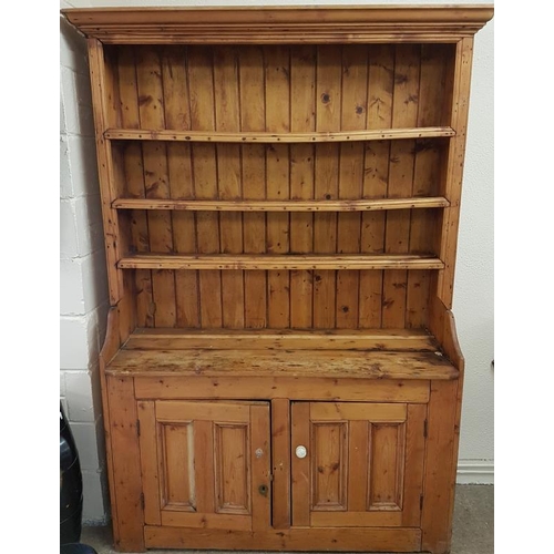 14 - 19th Century Irish Farmhouse Dresser with a moulded top over three open shelves on a base with a pai... 