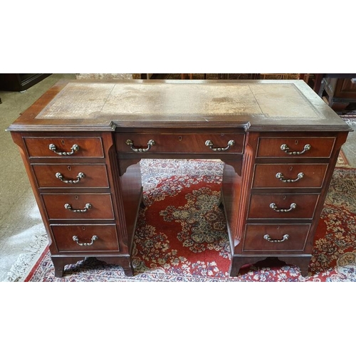 477 - Georgian Style Mahogany Inverted Breakfront Pedestal Desk with an arrangement of nine drawers and in... 
