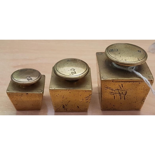 212a - Set of Three Brass Weights - 8oz, 4oz and 2oz
