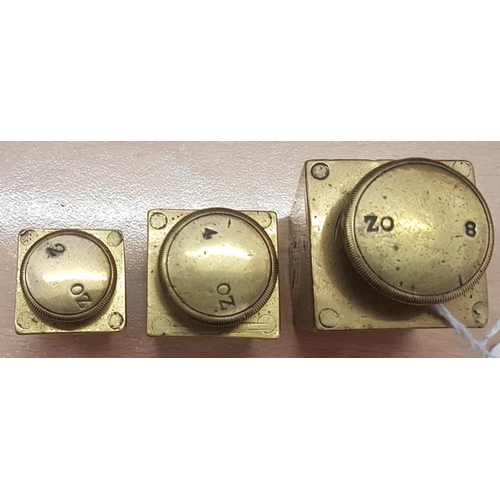 212a - Set of Three Brass Weights - 8oz, 4oz and 2oz