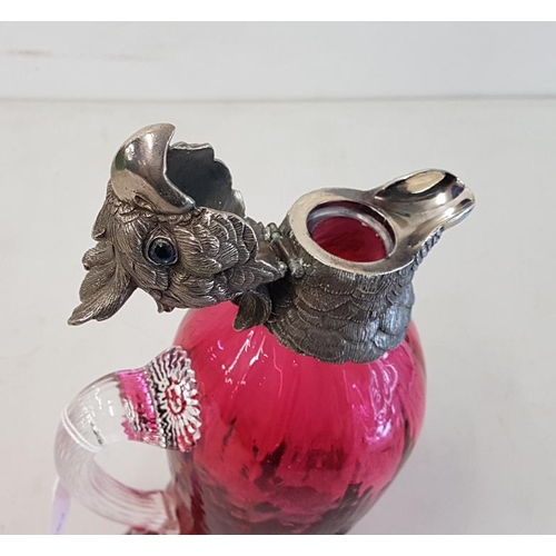 157 - Large Moulded Cranberry Glass Claret Jug in the form of a Parrot with Silver Plated hinged head with... 
