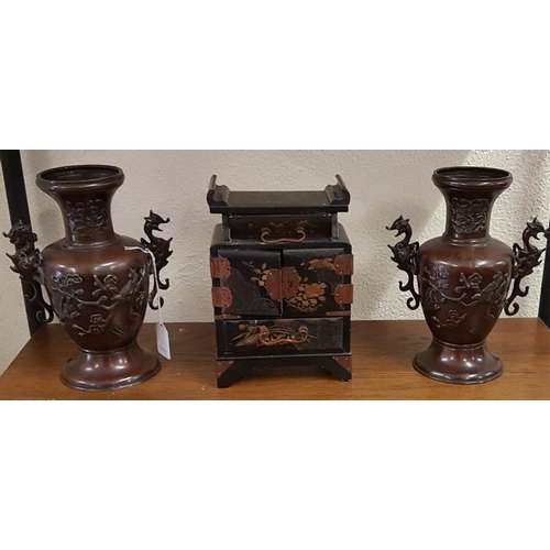 376 - Oriental Lacquered Table Cabinet and a Pair of Bronze Vases