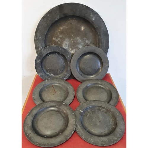 554 - !9th Century Pewter Service, comprising a large serving dish c.18in diam and six matching plates c.1... 