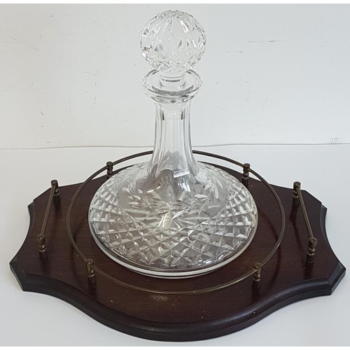 565 - Cut Glass Ship's Decanter on a Mahogany Stand