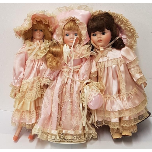128 - Three Old Style Dressed Dolls