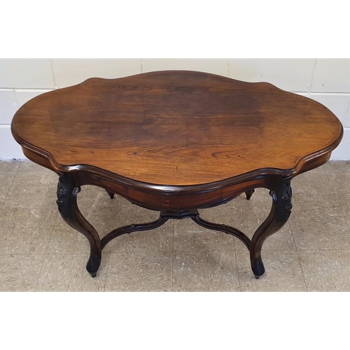 585 - 19th Century Rosewood Serpentine Shape Centre Table, the frieze with a pair of drawers and all raise... 