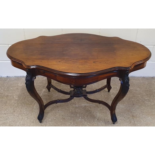 585 - 19th Century Rosewood Serpentine Shape Centre Table, the frieze with a pair of drawers and all raise... 