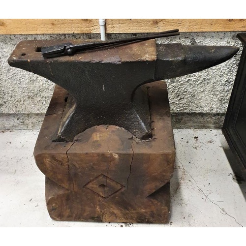 9 - Heavy Blacksmith's Single Bick Anvil on a carved wooden stand, with one former - 30ns wide x 29.5ins... 
