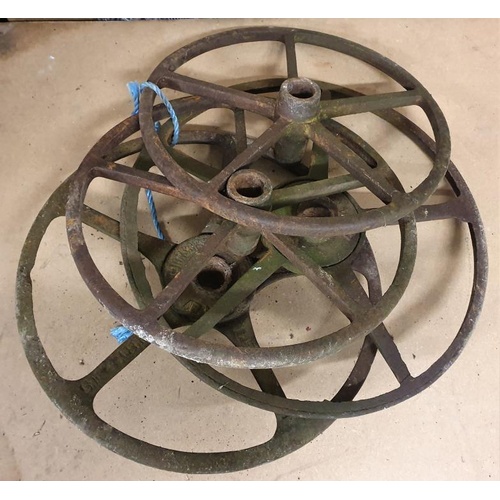 12 - Four Old Cast Iron Machine Wheels (2 x 15.5, 1 x 17.5 and 1 x 19ins diameter)