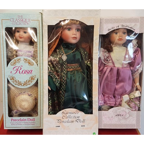 85 - Large Boxed Doll and Three Medium Boxed Dolls