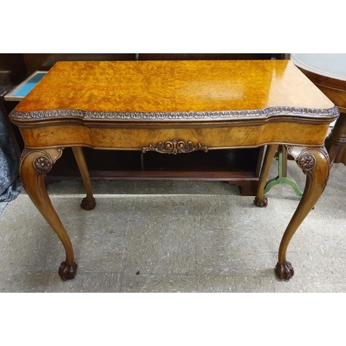 448 - Georgian Style Walnut Fold Over Card Table on carved legs with ball and claw feet - c. 36 x 28ins