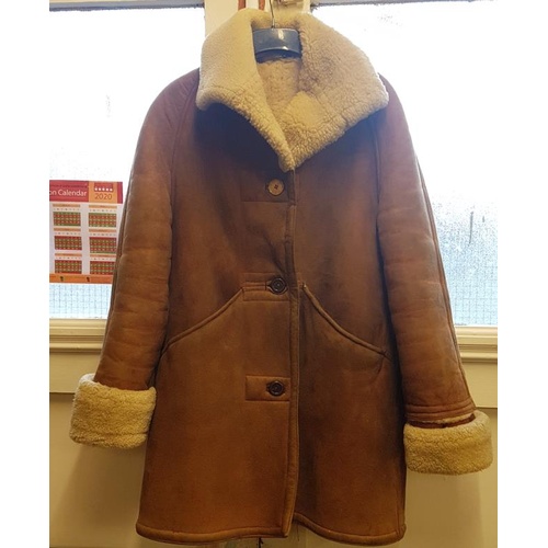 437A - Two Vintage Faux Fur Coats and a Men's Sheepskin Coat