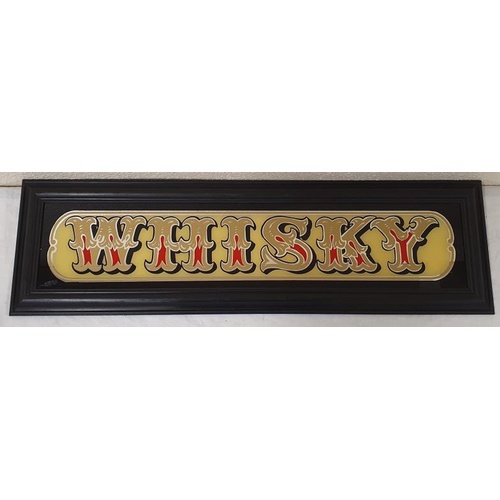 38 - Glass Reverse Painted Whisky Panel with a Black Frame, c.30.5 x 9in