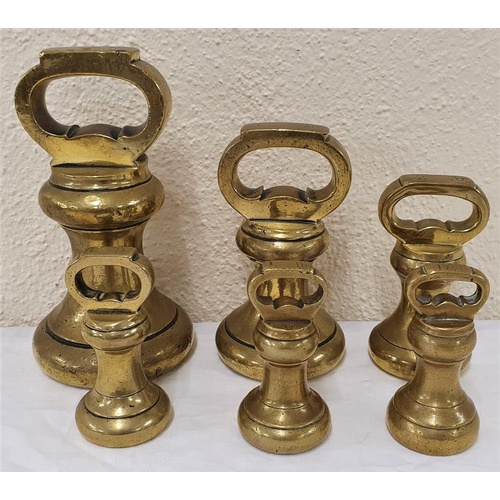 43 - Set of Six 19th Century Brass Bell Weights (7lbs, 4lbs, 2lbs and three 1lbs)