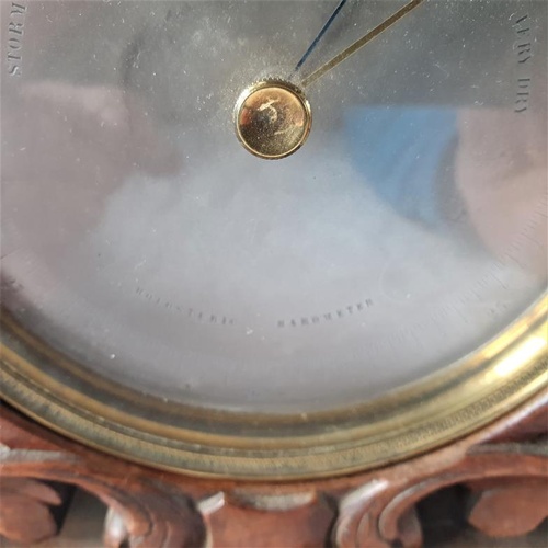 61 - Mid 19th Century Brass Cased Holosteric Barometer. The Case with Ring Hanging Loop above a Stepped R... 