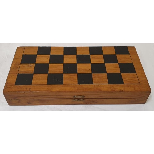 62 - Early 20th Century chess/draughts board with full draughts set, timber pieces, closes to become a bo... 