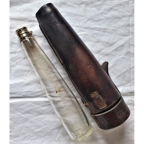 64 - 19th Century Saddle Flask with silver plated collar, tapering glass and leather case