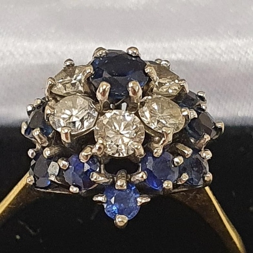 77 - 18ct Gold Sapphire and Diamond Cluster Flower Ring, c.size S