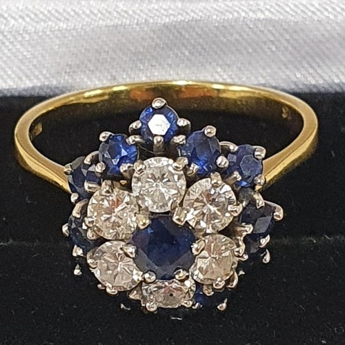 77 - 18ct Gold Sapphire and Diamond Cluster Flower Ring, c.size S