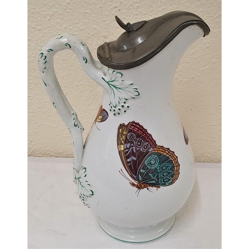 220 - 19th Century handpainted Harvest Jug with Pewter Lid depicting butterflies in flight, c.10in tall