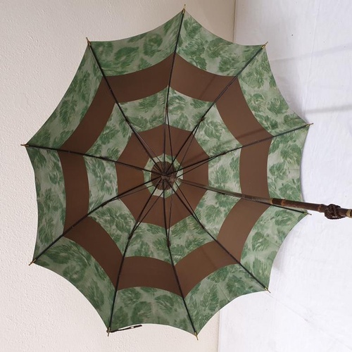 226 - Mid 20th Century Lady's Parasol with Chinese figured hardwood head and gilt metal mounts