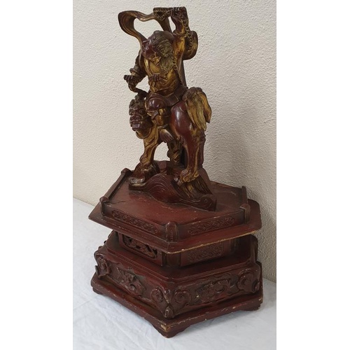 232 - Early to mid 20th Century red lacquered and gilded Chinese Figure on Stepped decorated base. Figure ... 