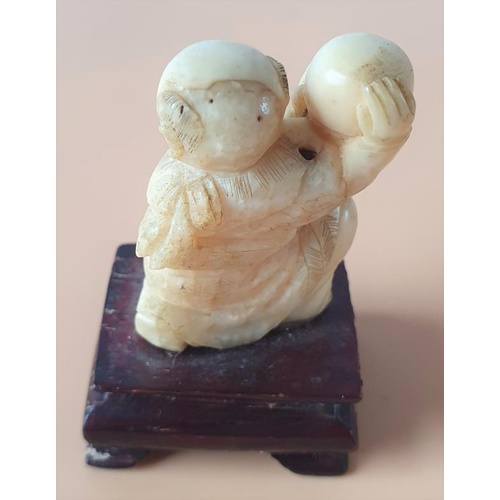 275 - Early 20th Century Carved Ivory Chinese Figure on a Hardwood Stand