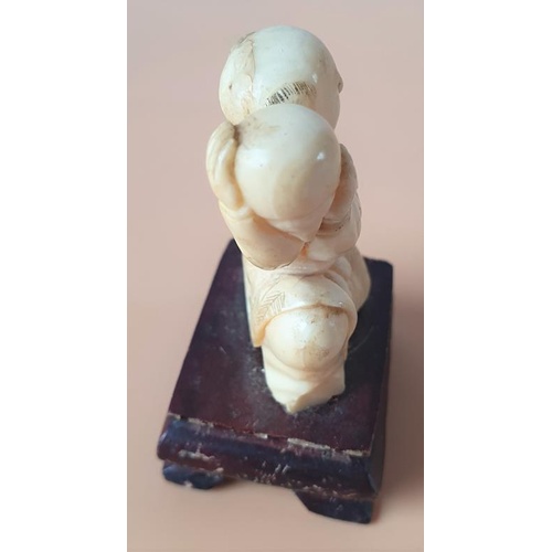 275 - Early 20th Century Carved Ivory Chinese Figure on a Hardwood Stand